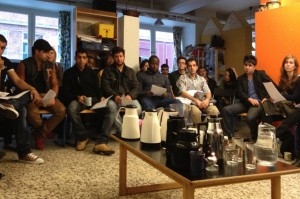 Participants in Trampoline House's weekly house meeting. Photo: Morten Goll